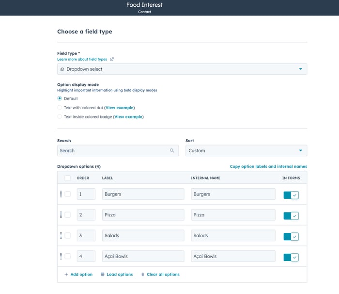 This image shows a form interface for creating a dropdown field with food-related options. The form displays settings for field type selection, display modes, and search/sort functionality, with a table showing four dropdown options: Burgers, Pizza, Salads, and Acai Bowls, each with corresponding order numbers and internal names. All options are currently enabled as indicated by the checked boxes in the "IN FORMS" column.