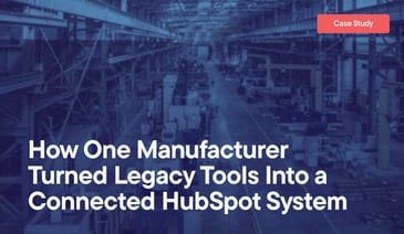 How One Manufacturer Turned Legacy Tools Into a Connected HubSpot System overlayed on an image of a metal manufacturing plant.