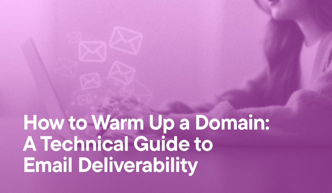 How To Warm up a Domain- A Technical Guide To Email Deliverability overlayed on an image of a woman sending emails from her laptop. Multiple envelope icons are flying out of the screen.