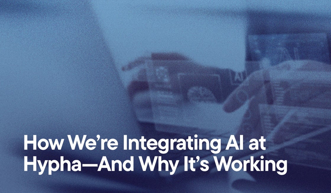 Image of computer and AI illustrations with text - How We’re Integrating AI at Hypha—And Why It’s Working