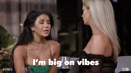 A woman saying, 'I'm Big On Vibes'