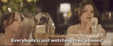 Aubrey Plaza yelling, saying 'Everybody is just watching their phones'