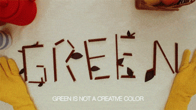 From Don't Hug Me I'm Scared, text reads 'Green is not a creative color,' with a character holding an X over the word GREEN