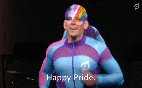 Peleton instructor Matty Maggiacomo with Pride flag facepaint saying, 'Happy Pride'