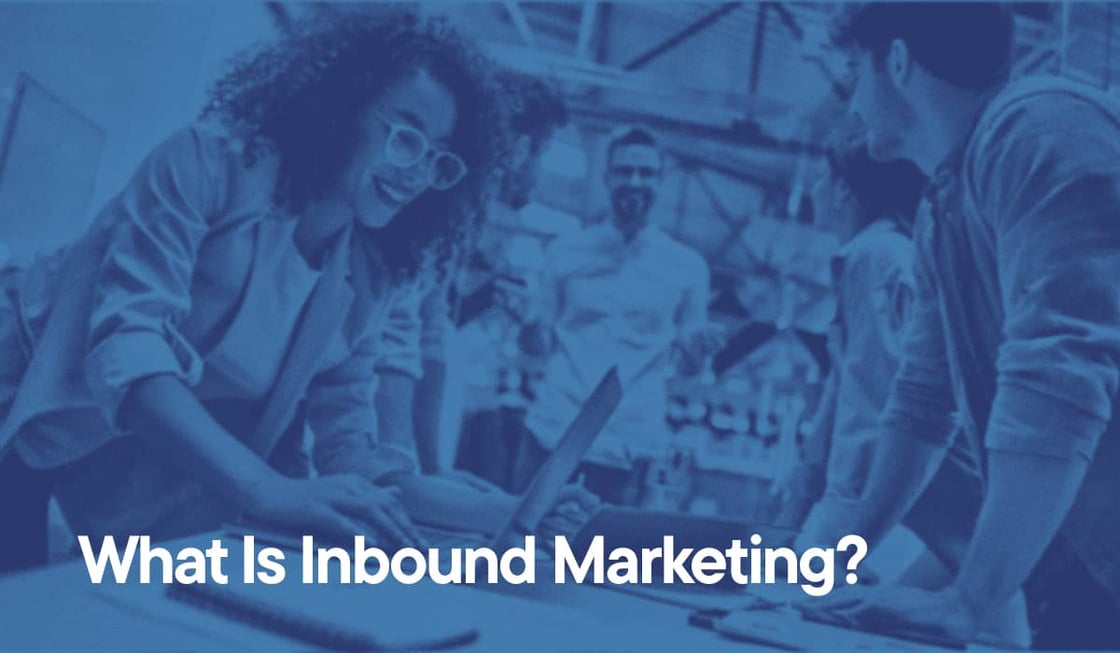 What Is Inbound Marketing overlayed on an image of young professionals working together in an office
