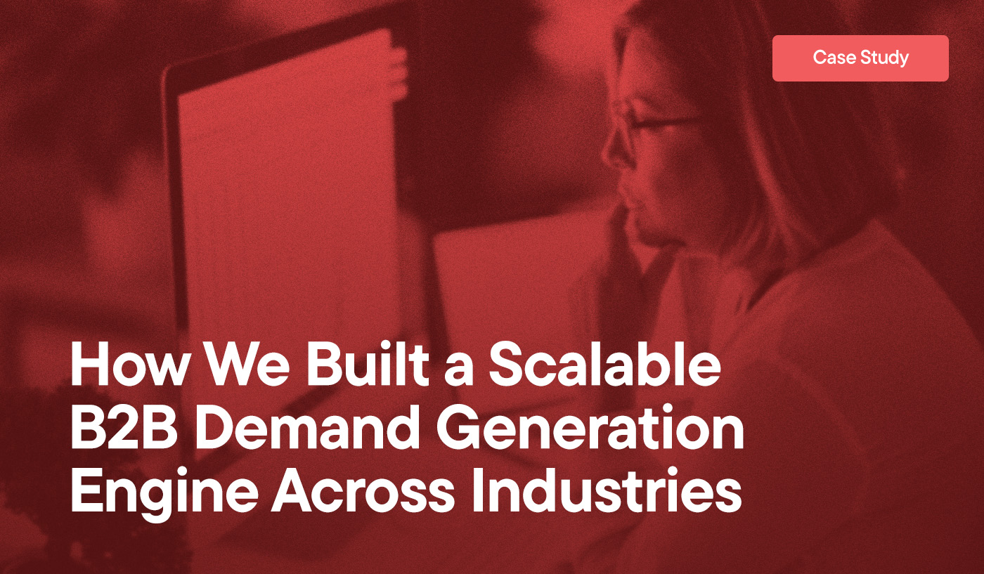 How We Built a Scalable B2B Demand Generation Engine Across Industries overlayed on an image of a woman working at her Mac computer.